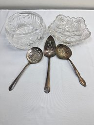 1 Crystal Serving Dish, Cigar Ashtray And 3 Silverplate Serving Utensils.