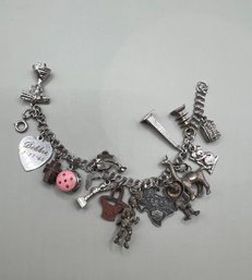 Sterling Charm Bracelet With At Least 7 Sterling Charms Out Of 14