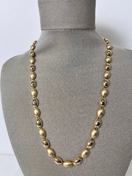 Gold Tone Necklace.