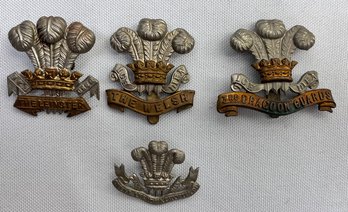 4 British Regiment Collar Badges.