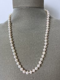 Cultured Pearl Necklace With 14k Clasp.