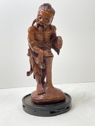 Japanese Handcarved Figurine Fishmonger Standing On Basket With Fish In Hand