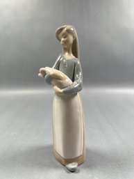 Lladro Girl Holding A Pig