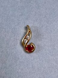 14K Yellow Gold, Diamond Faceted Red Stone Pendant