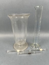 2 Beakers And 3 Glass Tubes 2 With Stir Sticks.