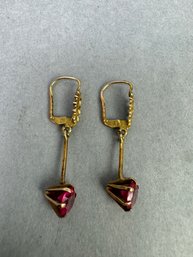 Gold Tone Pierced Earrings With Red Stones