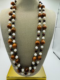 Brown And White Strand Of Beads Marked Hong Kong On Clasp