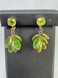 Gold Tone Clip Earrings With Green Stones