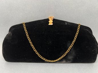 Black Velvet Clutch With Gold Chain And Closure.