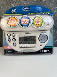 Coby Ct P650 Phone With Clock And Radio.