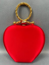 Red Heart Bag With Gold Handle.