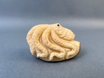 Small Resin And Nut Shell Carved Octopus.