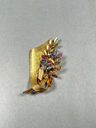 Rhinestone And Goldtone Floral Inspired Brooch