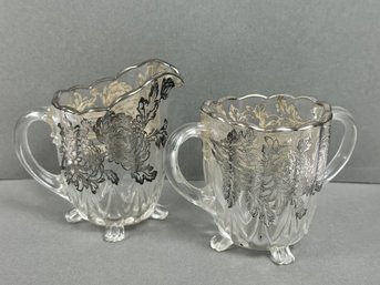 Pressed Glass Footed Creamer And Sugar With Silver Overlay