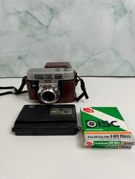 Kodak 35 Automatic Camera And A Kodak Disc 6000