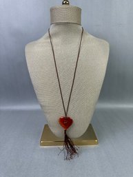 Asian Inspired Dark Amber Stone On Brown Cord