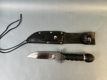 Survival Knife With Sharpener, Saw, Compass, Matches And Sheath.