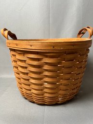 Longaberger Bushel Type Basket With Leather Handles.