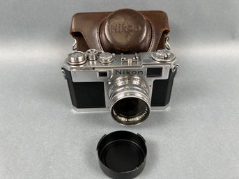 Vintage Nikon Camera With Case.