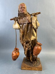 Paper Mache Figure Of An Old Lady Going To The Well.