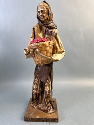 Paper Mache Figure Of An Old Lady With A Basket Of Flowers.