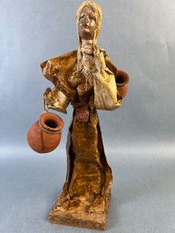 Paper Mache Figure Of A Girl Coming Back From The Well.