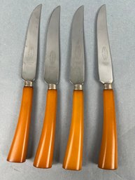 4 Vintage Amber Bakelite Handled Parker And Sons Steak Knives.