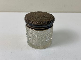 Silver Top On Small Glass Container- -2 Inches High