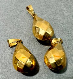 Three 18k Gold Pendants