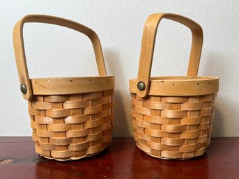 2 Small Baskets With Handles.