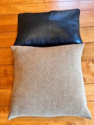 2 Throw Pillows, 1 Leather Top, 1 Brown Tweed.