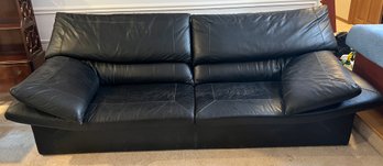 Long Black Leather Couch.