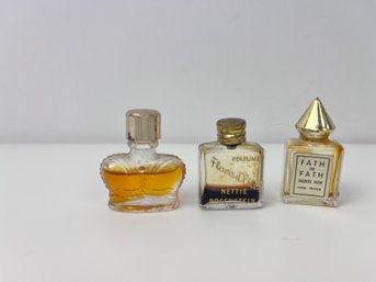 3 Small Perfume Bottles.