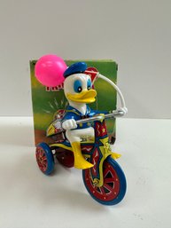 Vintage Mechanical Duck Tricycle Tin Toy