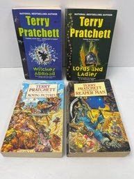 Lot Of 4 Terry Pratchett Softcover Books Reaper Man Moving Pictures Lords And Ladies Witches Abroad