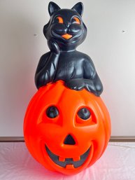 Halloween Lighted Blow Mold Of Pumpkin With Black Cat On Top.