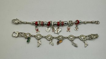 2 Silvertone Charm Bracelets