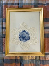 Framed Crocheted Doily With Blue Center