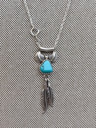 Silver Southwest Style Pendant And Chain W/Turquoise Accent.