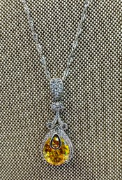 Silvertone Necklace With Yellow Stone Pendant