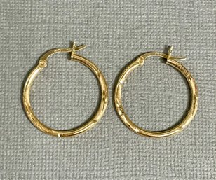 14K Yellow Gold Round Loop Earrings With Etched Design