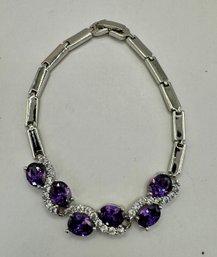 Silvertone Bracelet With Purple Stones