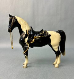 Pinto Horse With Saddle