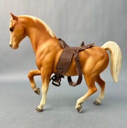 Tan Horse  With Brown Saddle