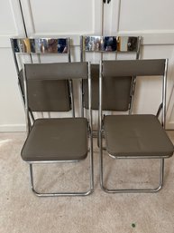 Set Of Four Vintage Sanket Padded Chrome Folding Chairs.