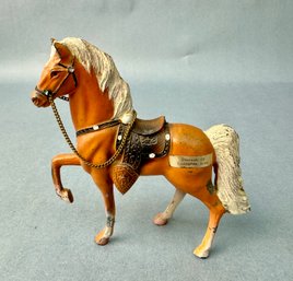 Tan Metal Horse With Saddle