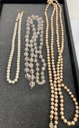 58' Strand Of Simulated Pearls And Two Strands Of Glass Beads