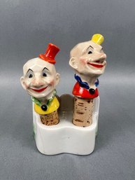 2 Vintage Porcelain And Cork Clown Bottle Stoppers With Holder.