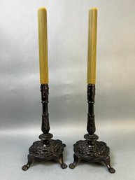 Pair Of Vintage Cast Iron Footed Candle Holders.