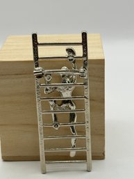 Person Climbing Ladder Brooch